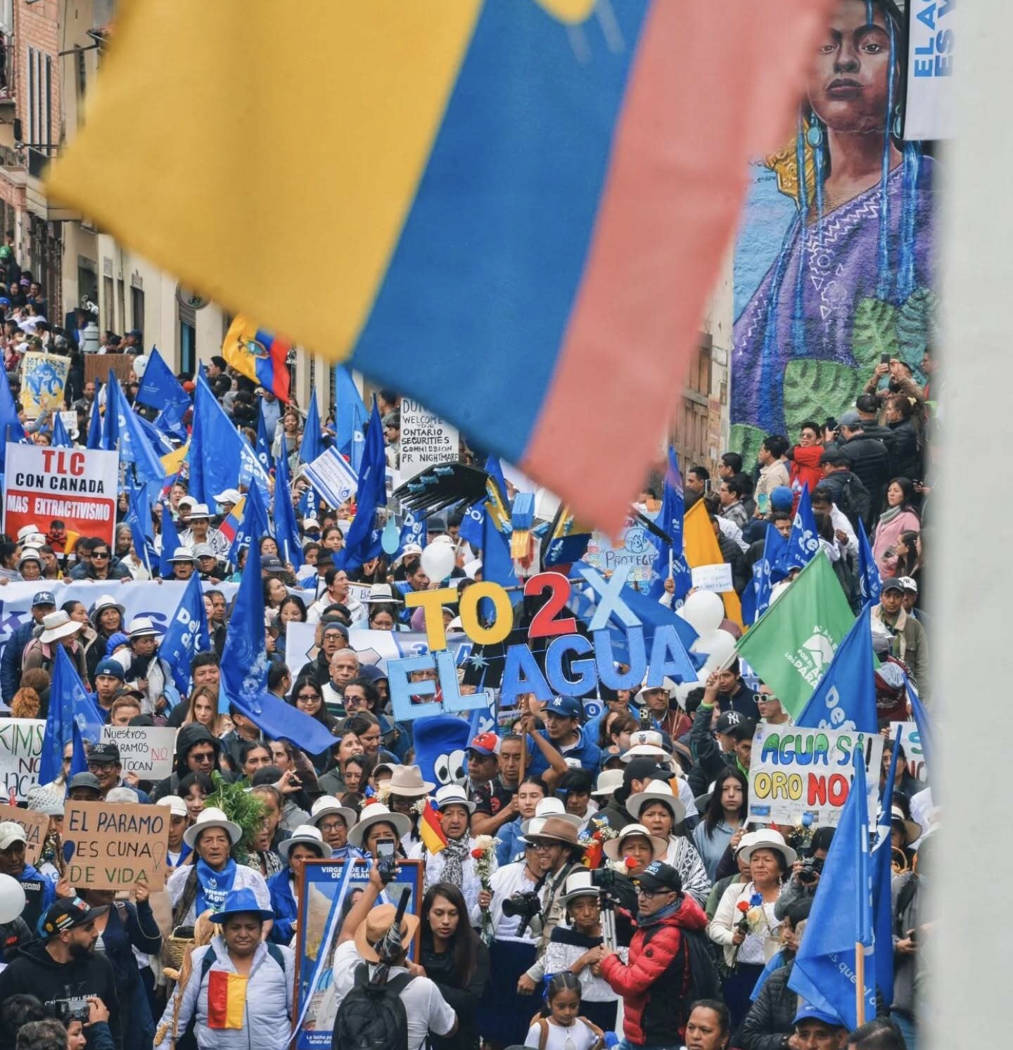 Thousands flood the streets of Cuenca, Ecuador carrying colourful protest signs in a massive march for the protection of water. 